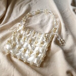 Handmade pearl beaded bag with satin pouch